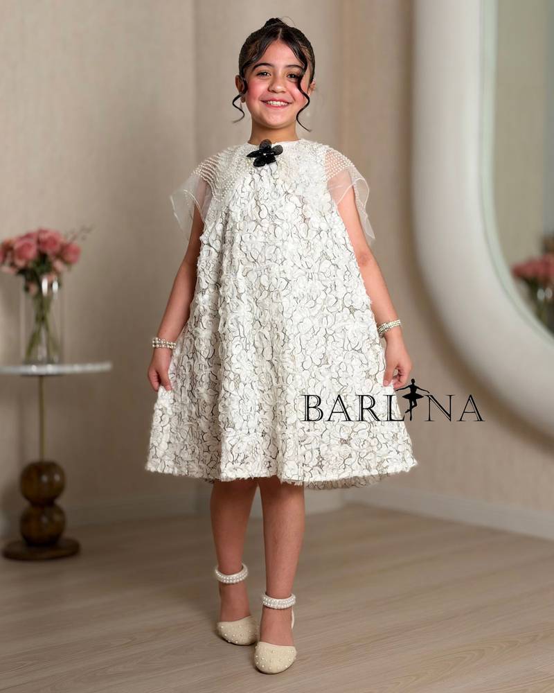 White lace girl's dress with a black rose