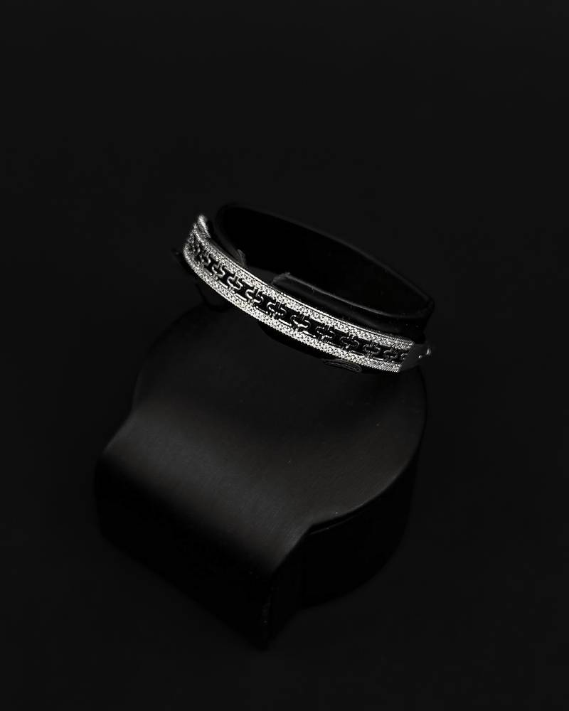 Bracelet and ring with a wide, flat design