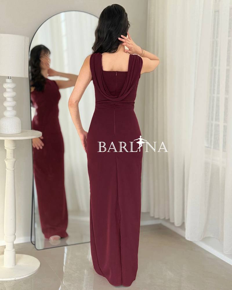 A soft burgundy dress adorned with crystal details