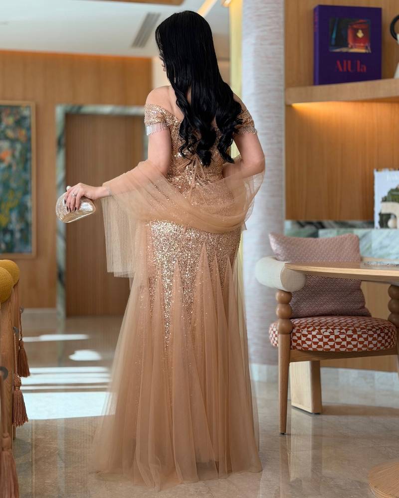 فستان تل سهرة ذهبي مرصع بترتر لامع