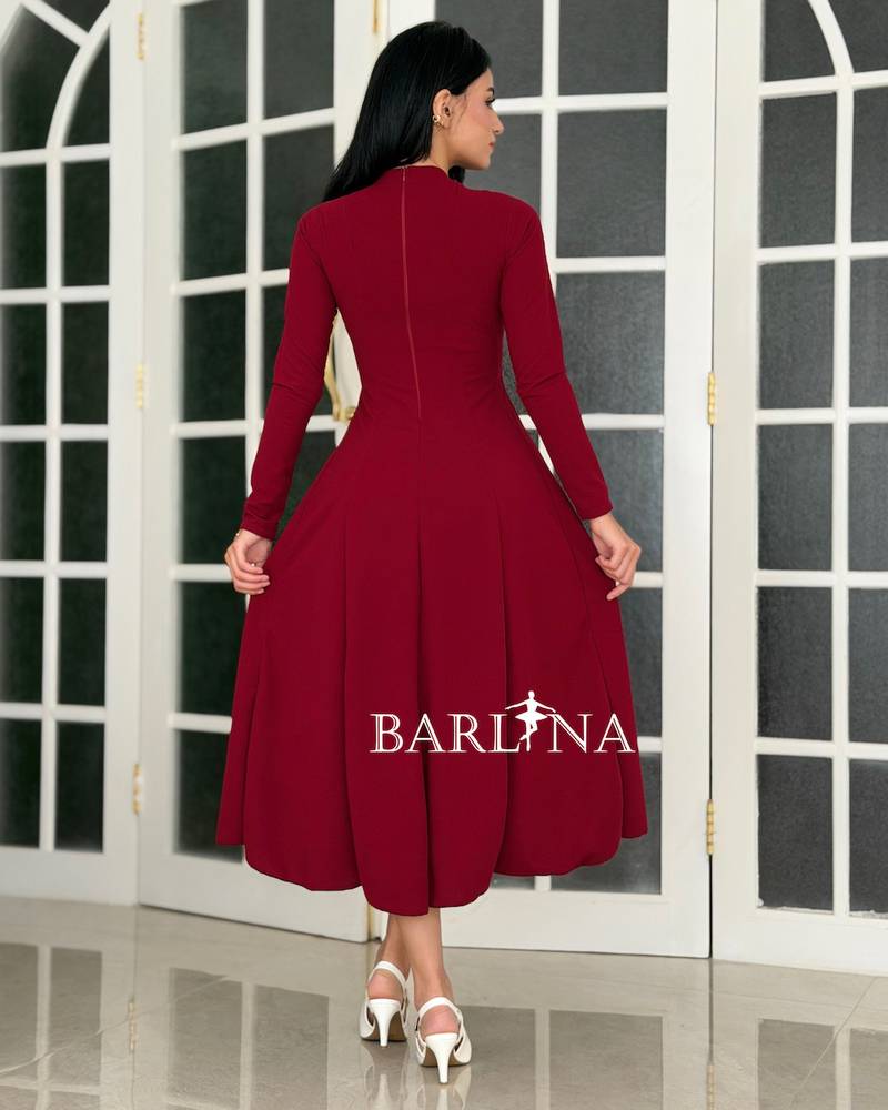 A soft red dress with a sophisticated classic design