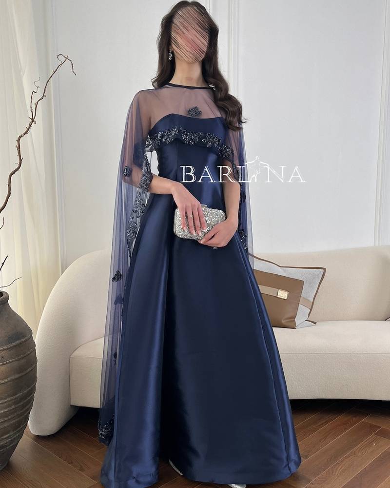 Long navy blue evening dress with a transparent cape