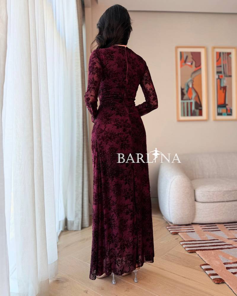 Elegant burgundy velvet dress with luxurious patterns