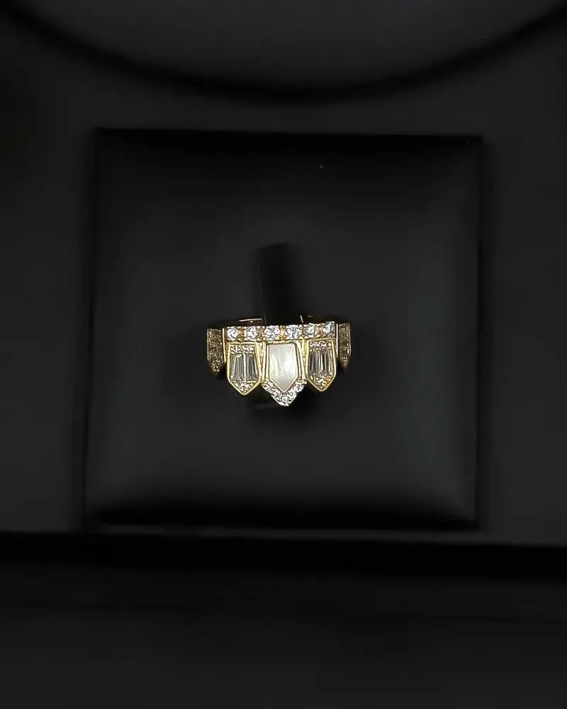 Unique gold accessory set with a geometric design