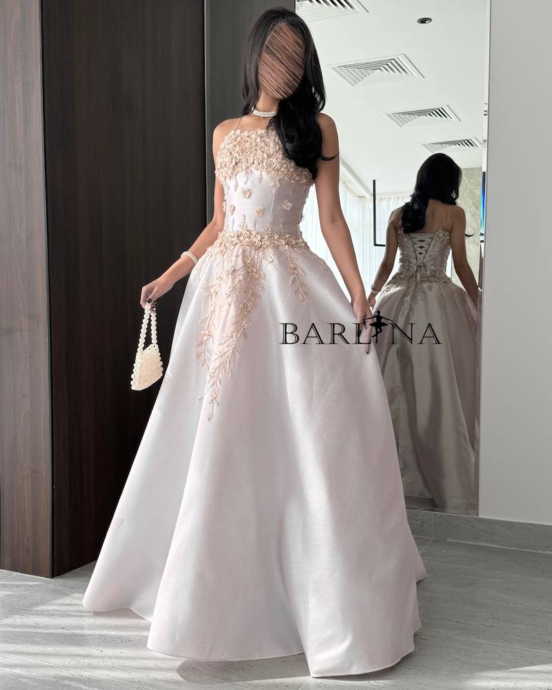 Light pink dress with prominent floral design