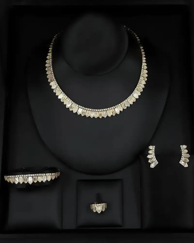 Unique gold accessory set with a geometric design