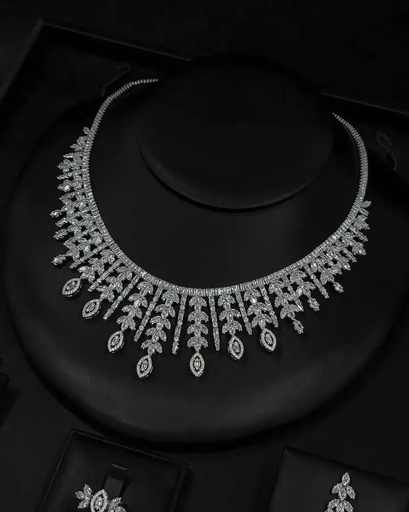 Crystal-studded accessory set with a dangling design