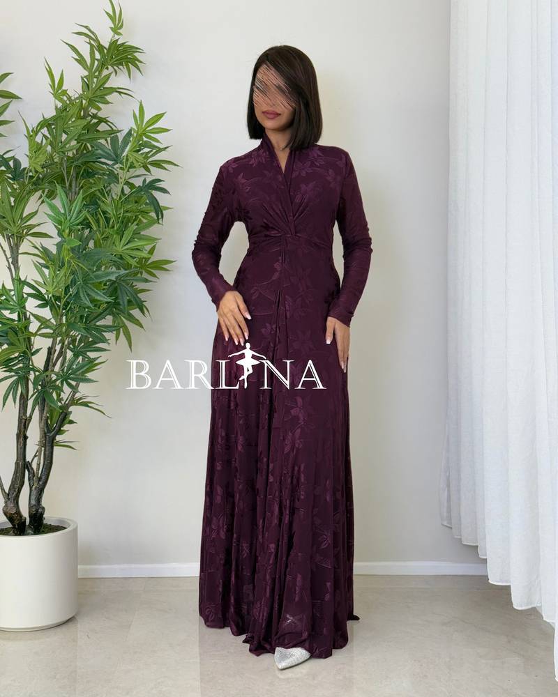 A soft purple dress with a subtle patterned fabric