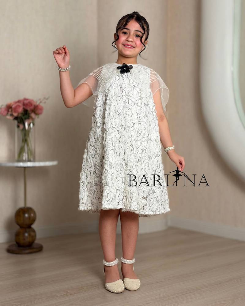 White lace girl's dress with a black rose