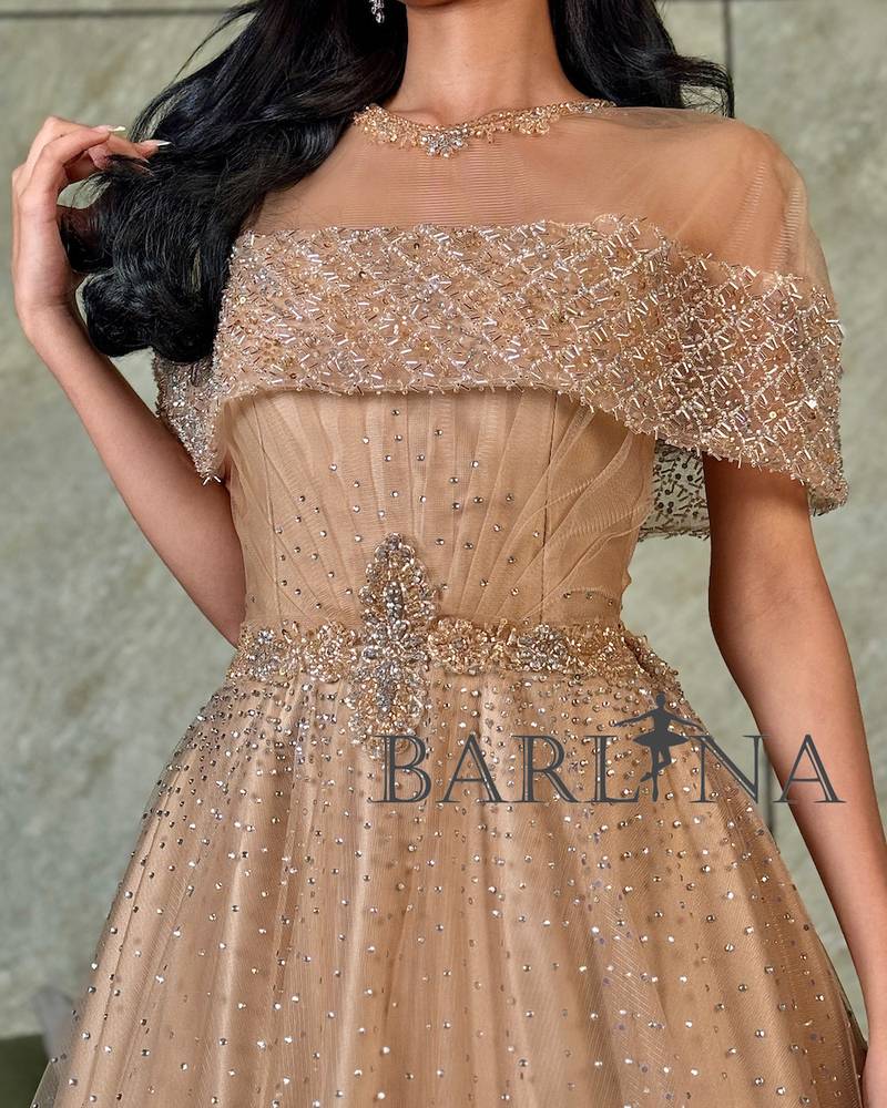 Beige off-the-shoulder dress with shiny embroidery