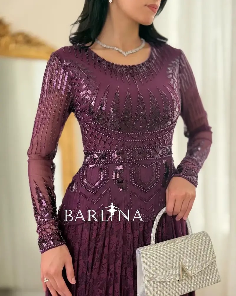 Lace evening dress with embroidered bodice