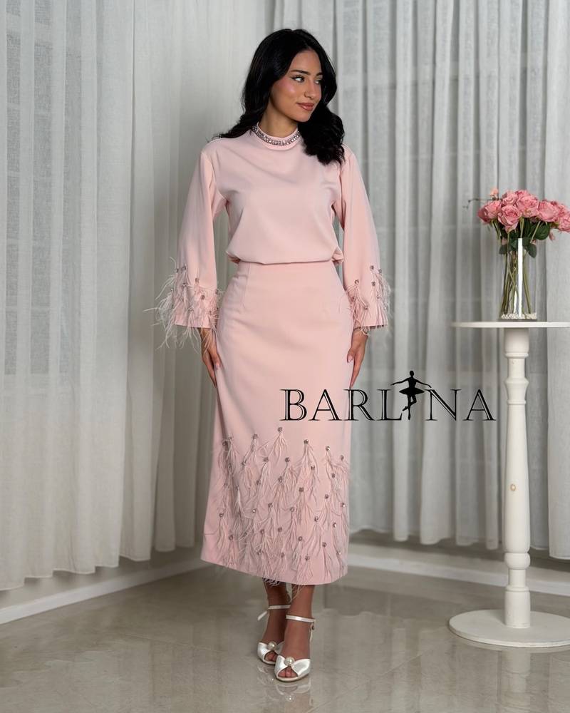 Soft pink midi set with elegant feather details