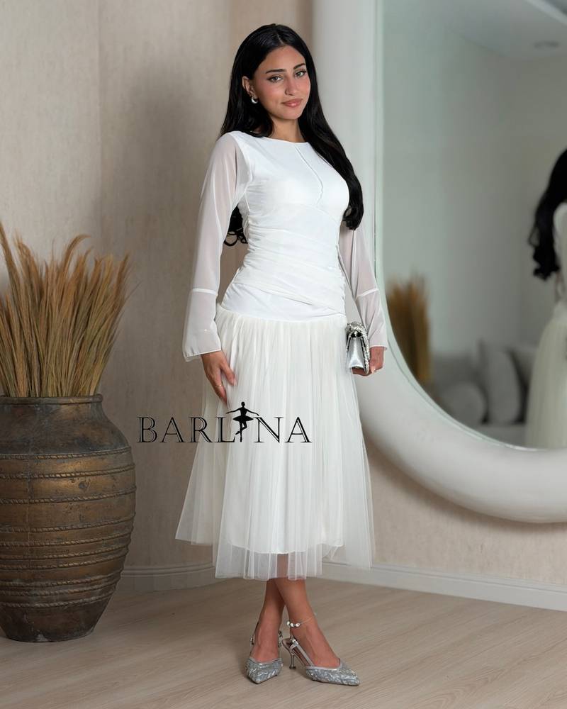 Soft off-white tulle dress with a low waist