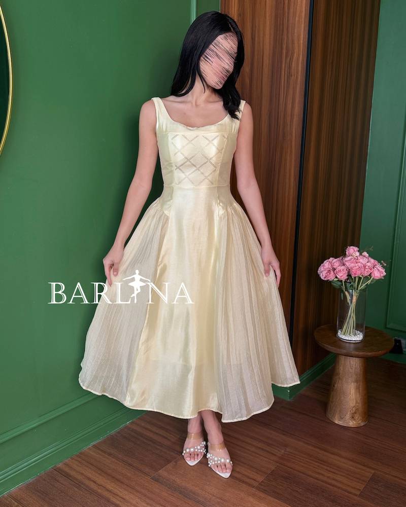 Soft beige shiny midi dress with soft pleats