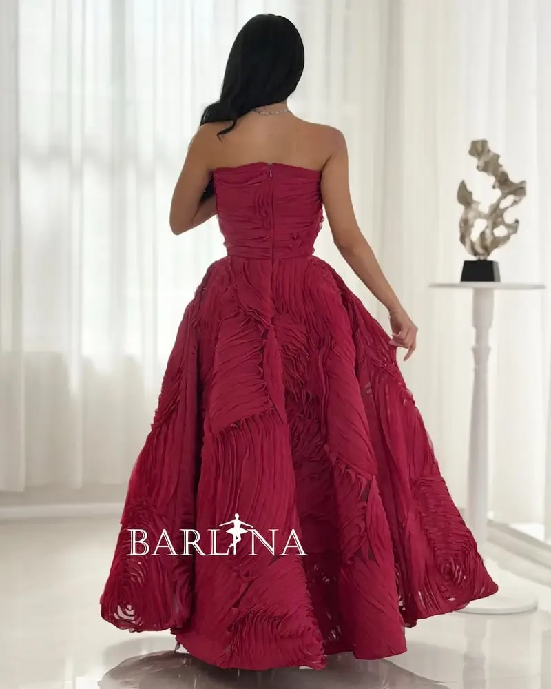 Red evening dress with 3D details