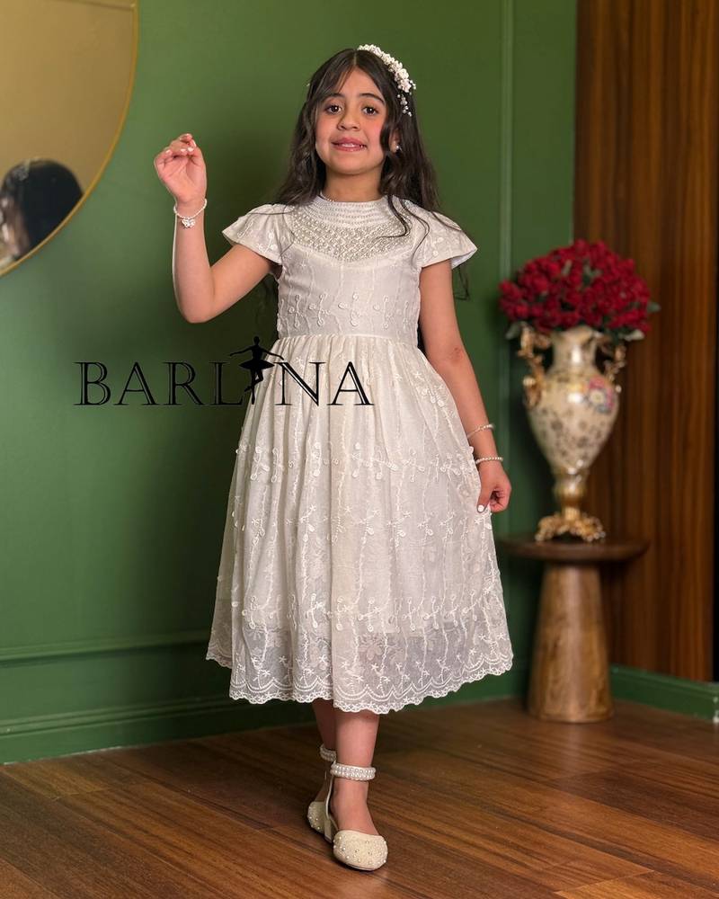 Girls’ dress with a pearl-embellished collar