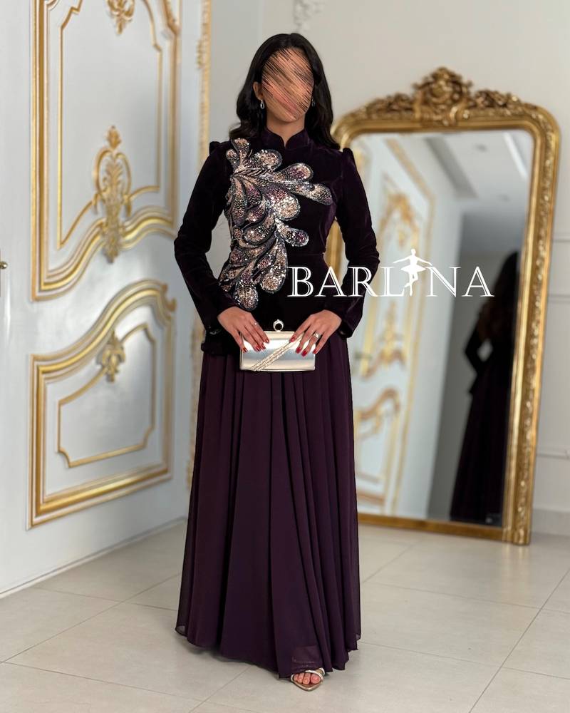 Long dark purple dress with luxurious embroidery