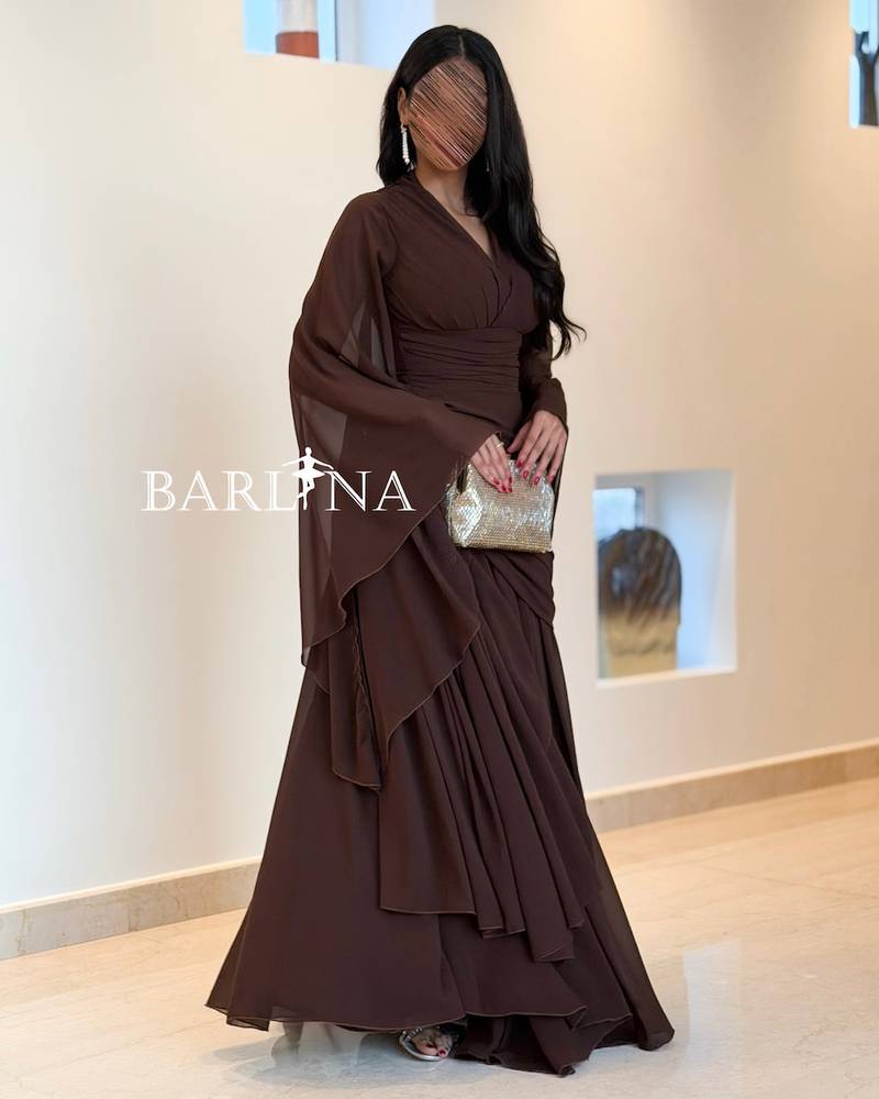 Soft brown chiffon dress with a draped design