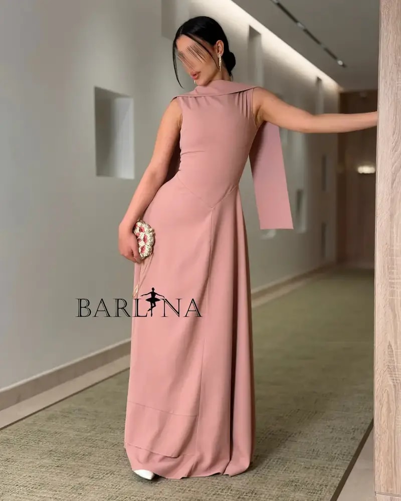 Soft, long pink dress with a simple design