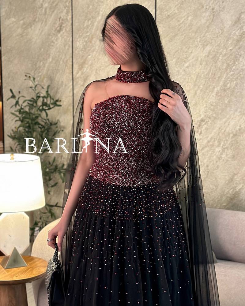 فستان سهرة أسود فخم بفصوص لامعة 