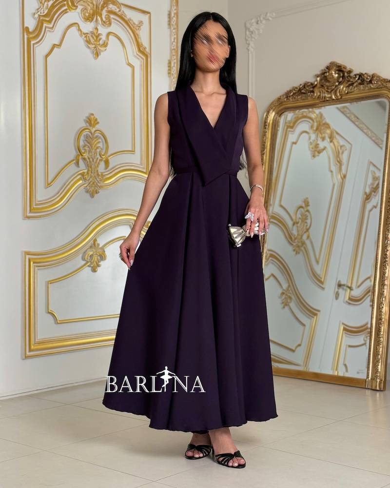 Dark purple dress with an elegant formal collar