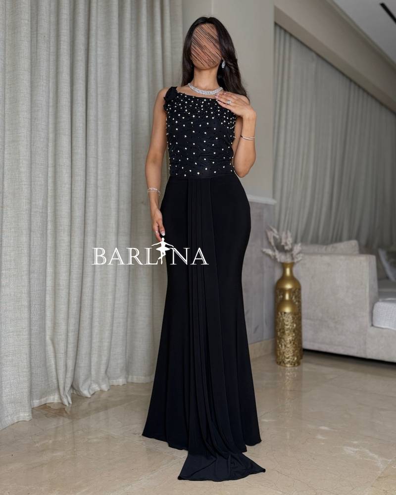 Black one-shoulder dress with crystal beads