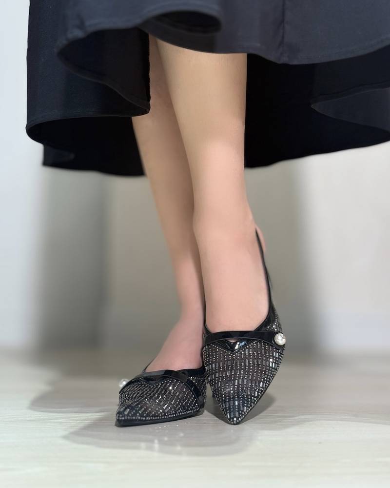 Women's shoes with elegant, shiny heels