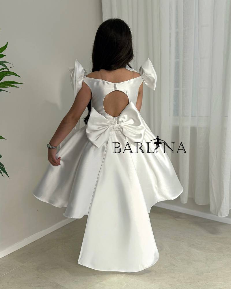 White girl's dress with delicate floral details