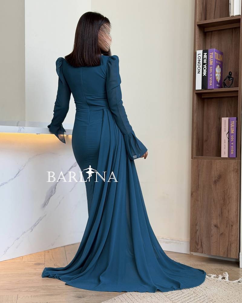 Petrol dress with a light side tail