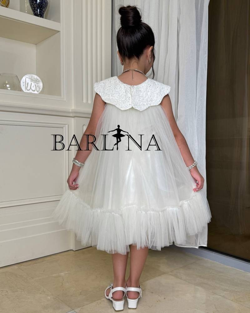 Ivory tulle girls' dress with a soft design