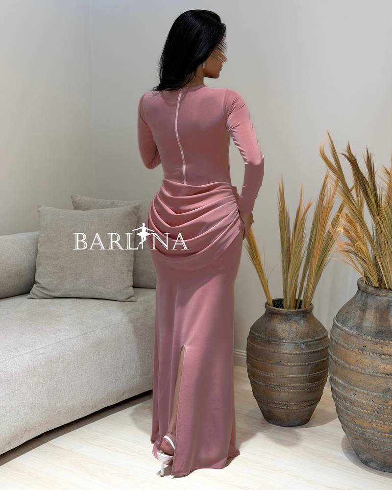 Dark pink fitted dress with side draping