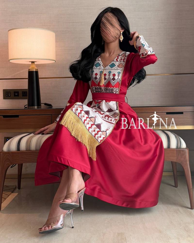 Red midi dress with traditional patterns