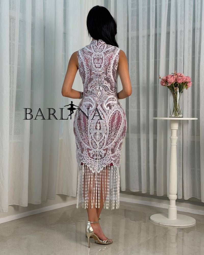 White dress with lined fabric and draped hem