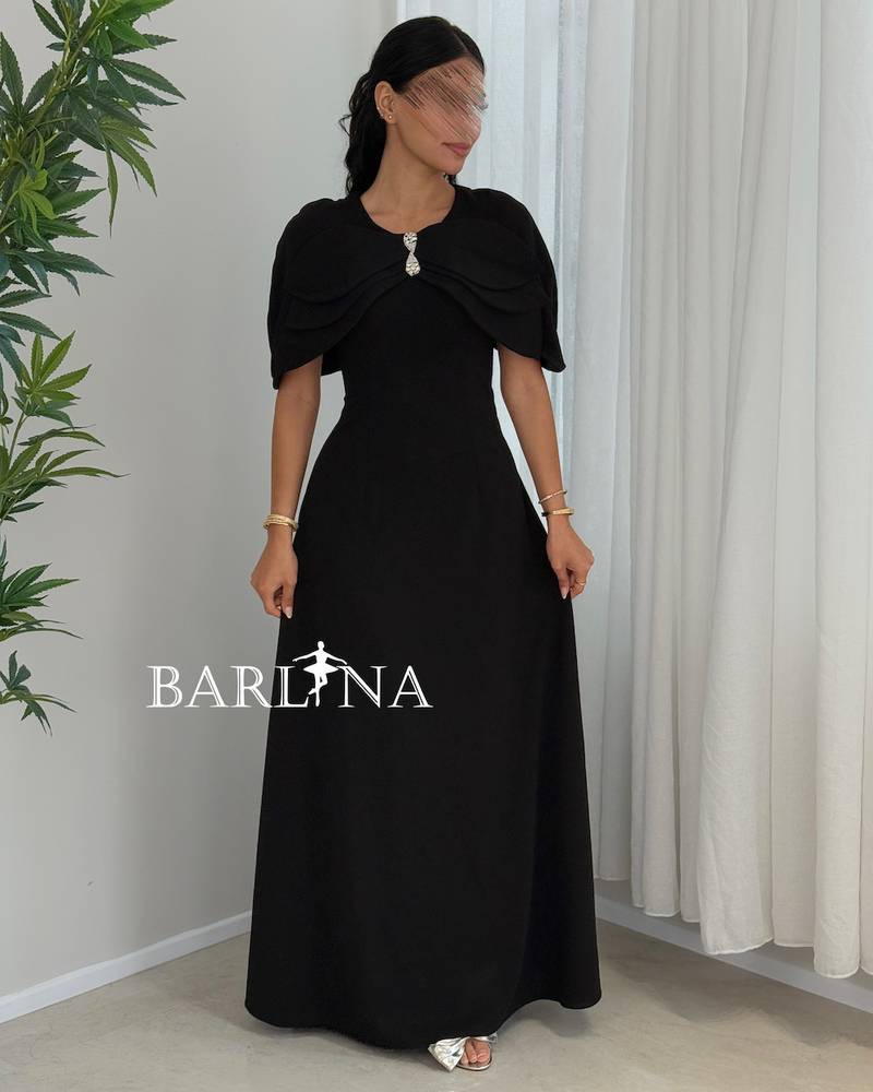 A soft black dress with crystal detailing