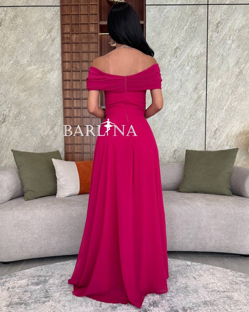 Elegant long ofF-the-shoulder dress in fuchsia