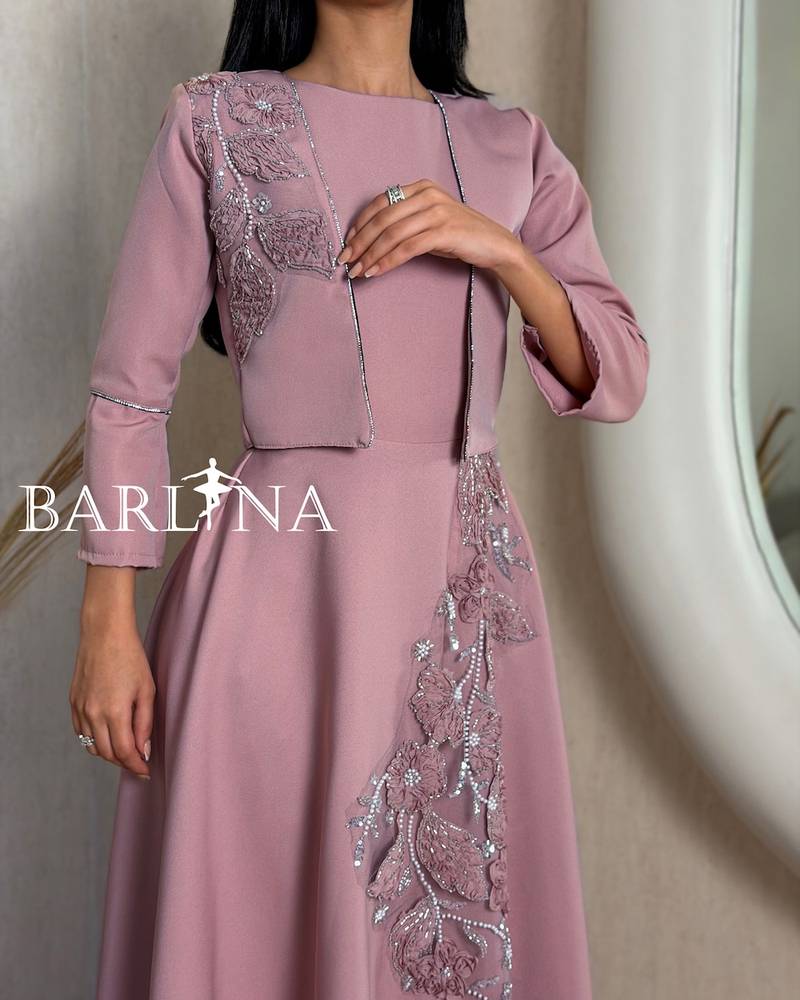 Pink dress with a short embroidered jacket