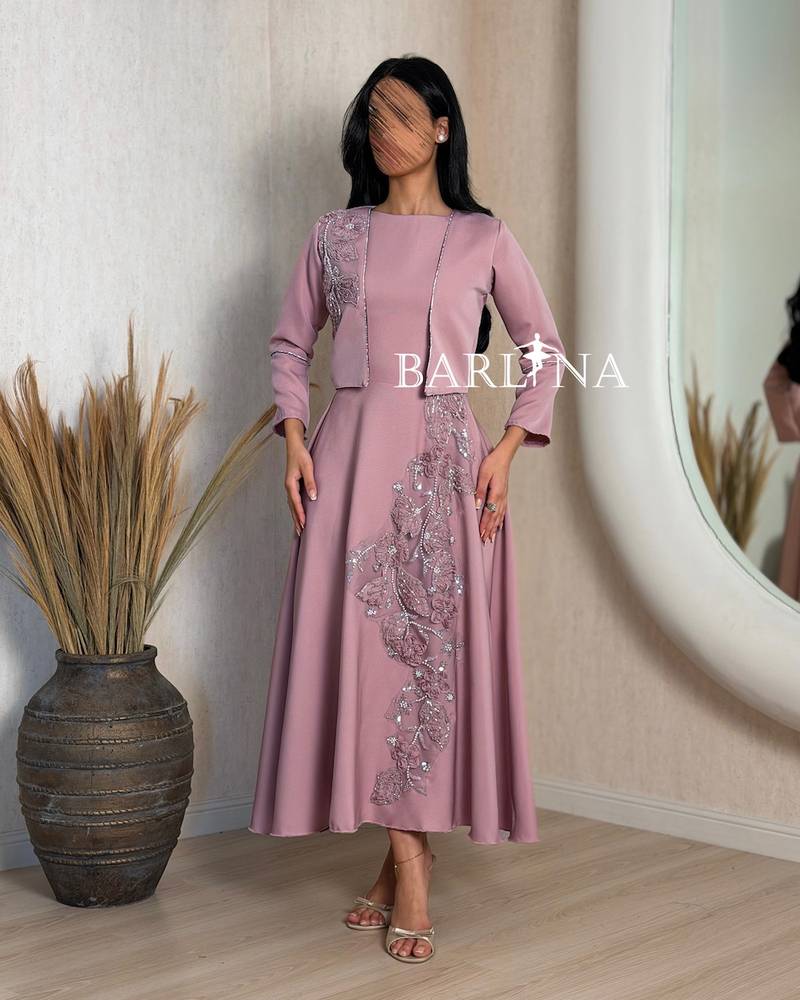 Pink dress with a short embroidered jacket