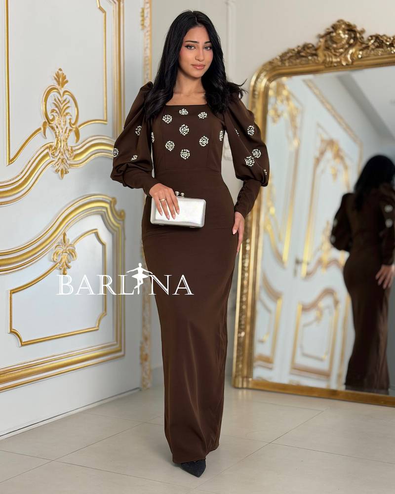 Long brown embroidered dress with a straight cut