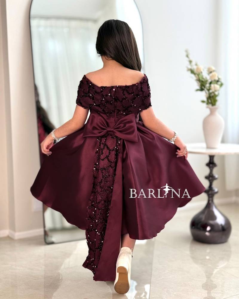 Girls' burgundy evening dress with a wide cut