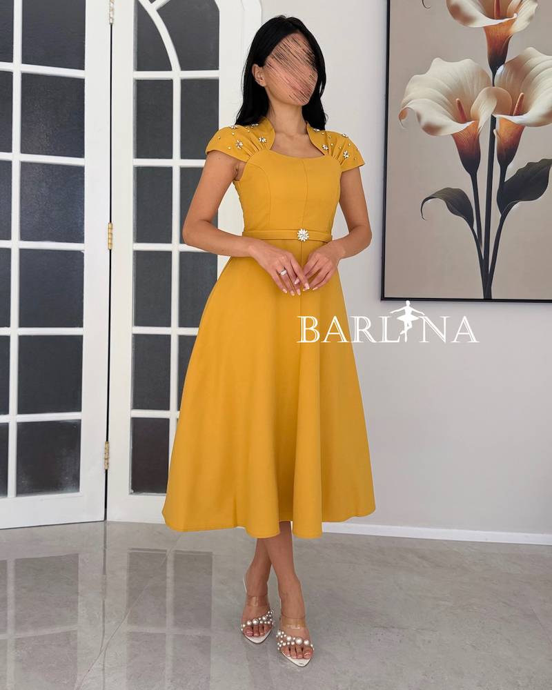 A soft dress adorned with delicate details