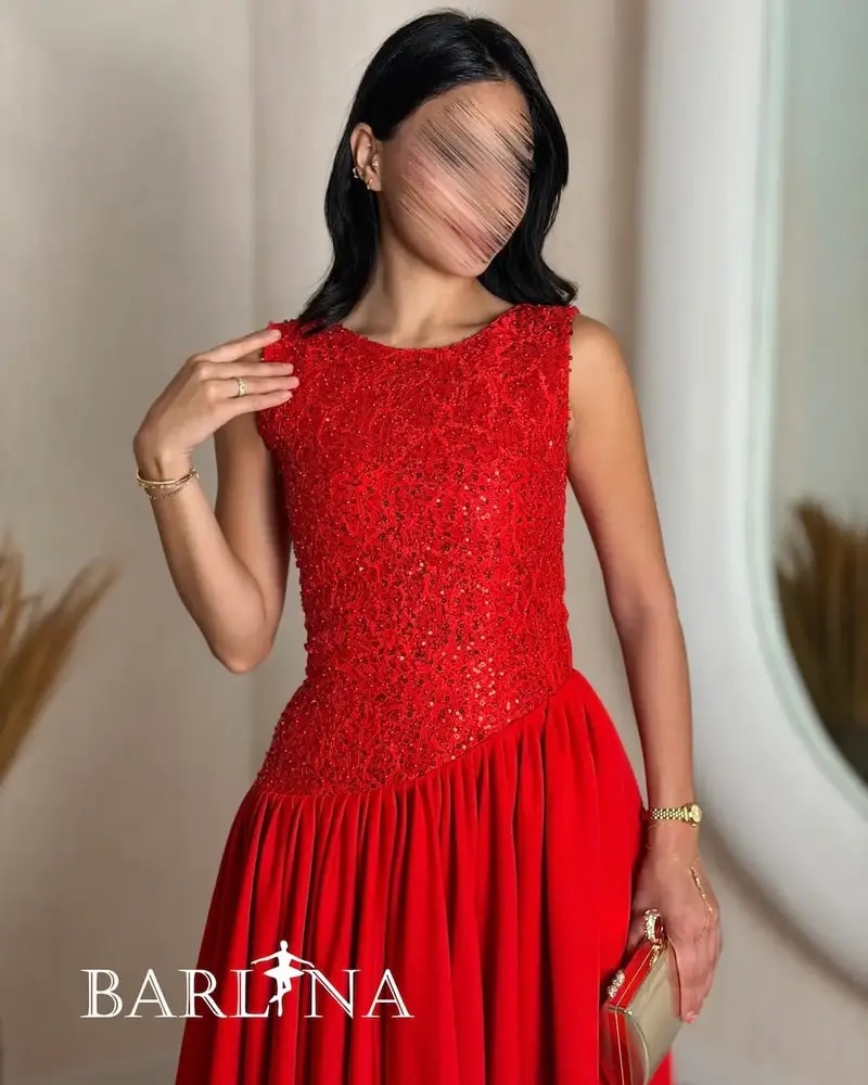 Soft midi dress with a sequined bodice