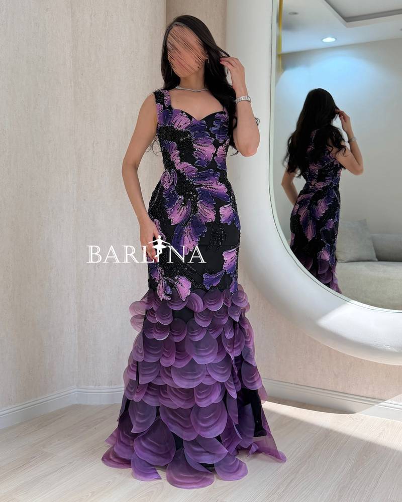 Black floral dress with a tiered train