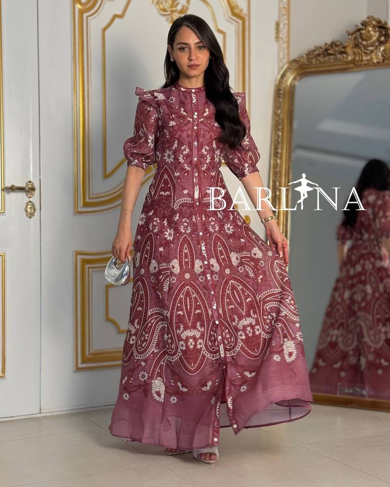 Long pink dress with soft ruffled sleeves