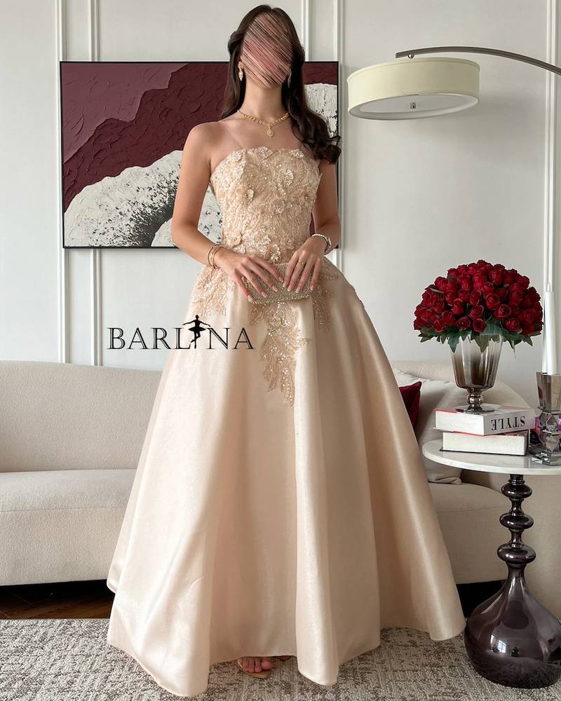 Elegant beige evening dress with back tie
