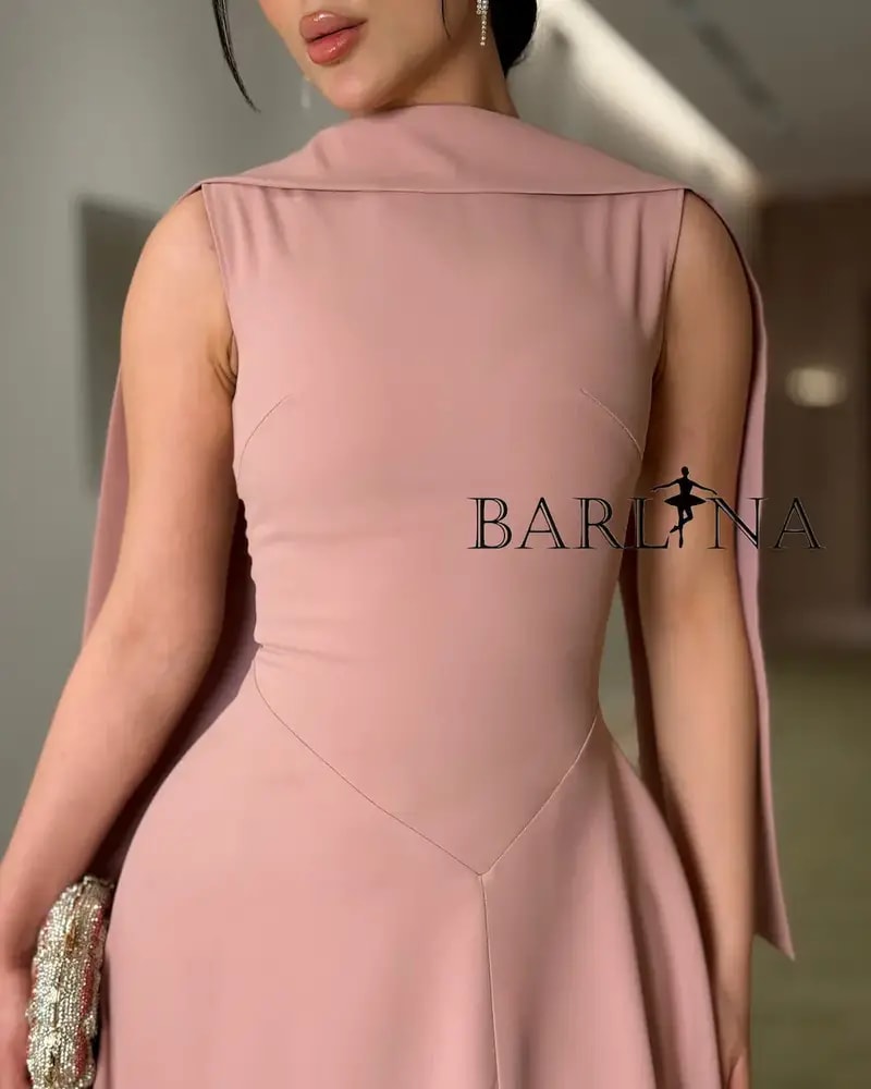 Soft, long pink dress with a simple design