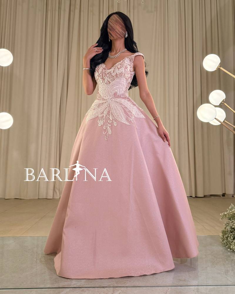Pink evening dress with beaded embroidery