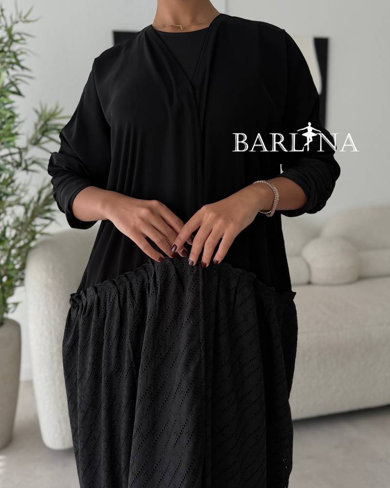 Elegant black abaya with patterned fabric