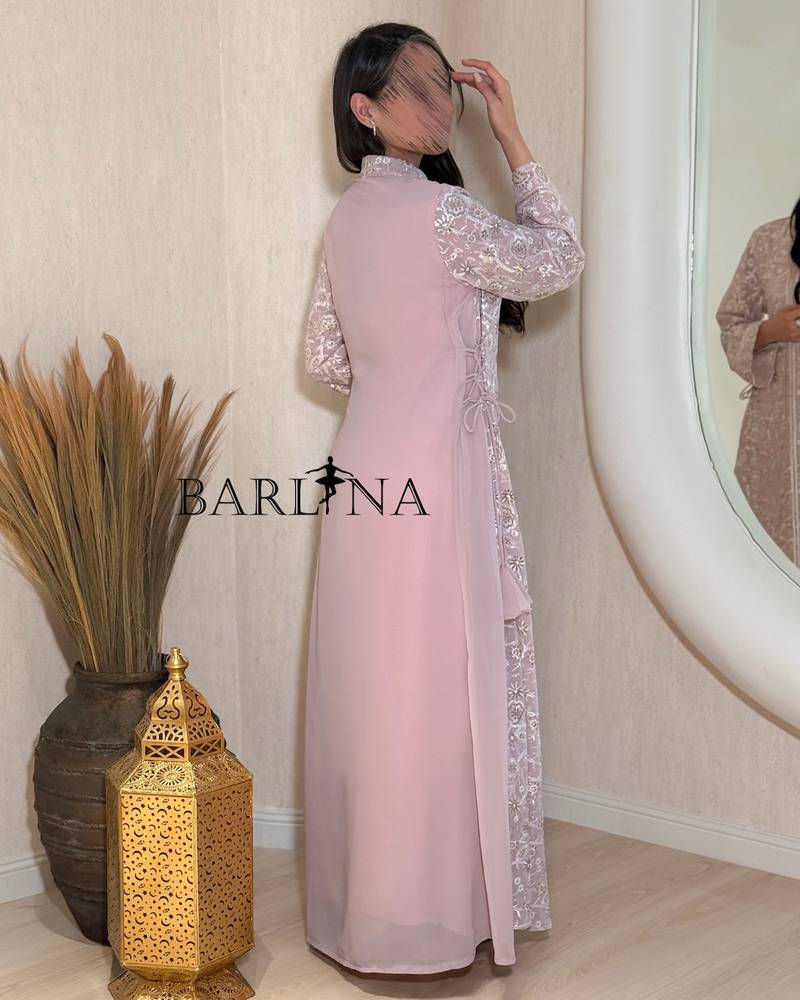 jalabeya with white embroidery and a side tie