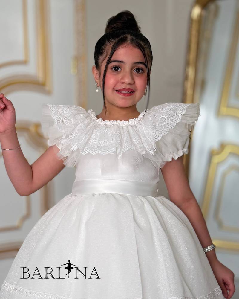 white fluffy girl's dress with lace details