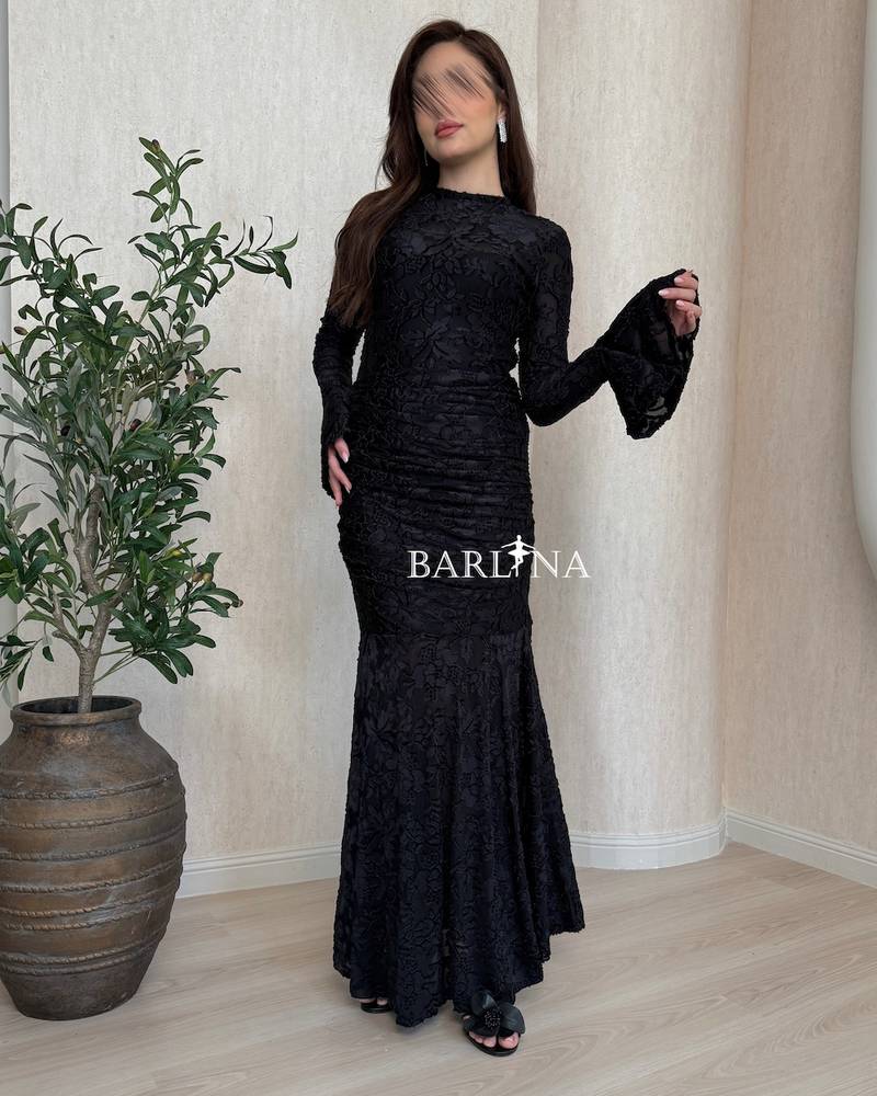 Black floral dress with long bell sleeves